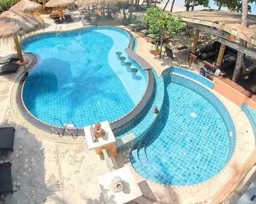A Beachfront Resort With Swimming Pool 